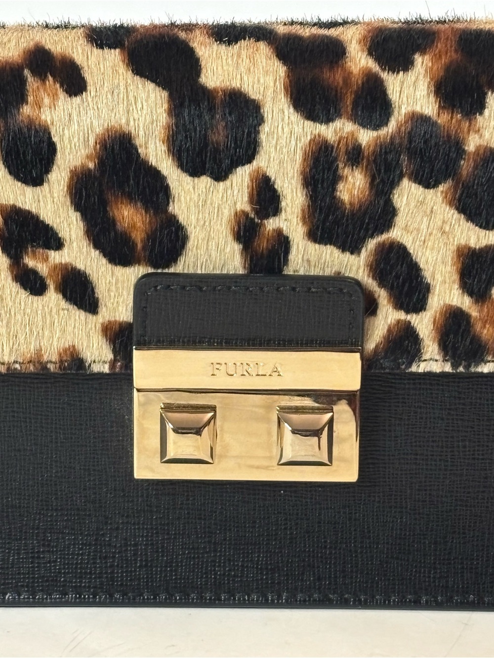 Furla Bella mini crossbody with leopard print calf hair and leather. Adjustable